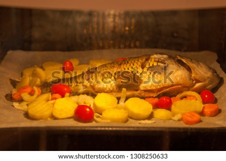 baked fish in the oven with vegetables