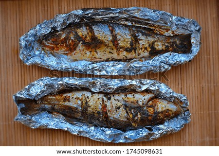 baked Fish Sea bass on the table