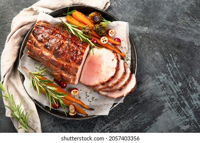 Baked Ham With Vegetables On Dark Background. Traditional Food Concept. Top View, Flat Lay, Copy Space