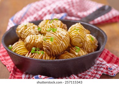 Baked Hasselback Potatoes With Cheese And Green Onion