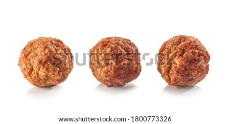 baked homemade meatballs isolated on white background