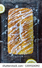 Baked Lemon Poppy Seed Cake Loaf With White Icing Drizzle Flat Lay