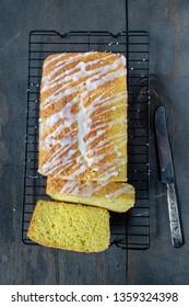 Baked Lemon Poppy Seed Cake Loaf With White Icing Drizzle Flat Lay