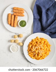 Baked Macaroni and Cheese with mozzarella cheese finger crispy fried, sauce on marble background top view
