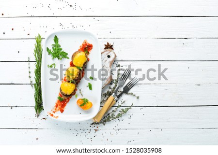 Similar – Foto Bild Hähnchenspieße mit Zucchini und Paprika zubereiten