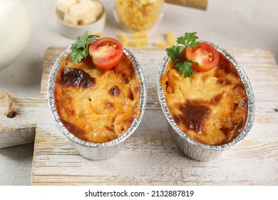 Baked Pasta On A Wooden Tray, Made With Cheese And Milk