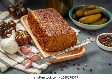 Baked Pate With Green Lentils On A Wooden Tray