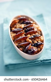 Baked plum with beans
