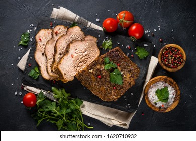 Baked Pork Meat, Glazed Ham On Black Kitchen Table With Spices. Top View With Copy Space.