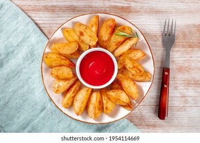 Baked Potato Wedges With A Fork And A Napkin, Overhead Flat Lay Shot