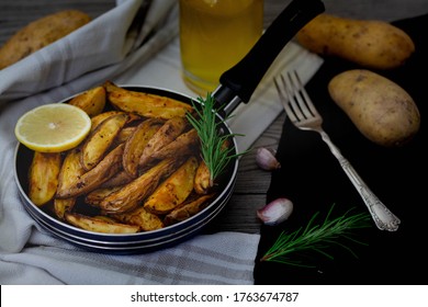 aesthetic potatoes images stock photos vectors shutterstock https www shutterstock com image photo baked potato wedges rosemary garlic lemon 1763674787