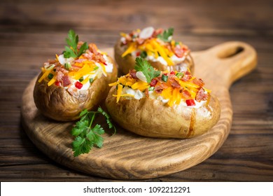 Baked potatoes with cheese and bacon