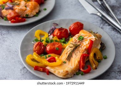 Baked red fish fillet Arctic char on a plates with vegetables close up, delicious hearty healthy dinner - Shutterstock ID 1972911449