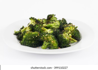 Baked Roasted Garlic Parmesan And Olive Oil Broccoli Side Dish On Wooden Table