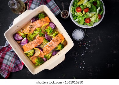 Baked Salmon Fillet With Broccoli, Red Onion And Lemon. Top View, Overhead