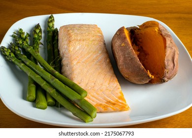 Baked Salmon Fillet  Served With  Sweetpotato And Asparagus,