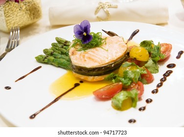 baked salmon fish fillet with cherry tomato and asparagus - Powered by Shutterstock