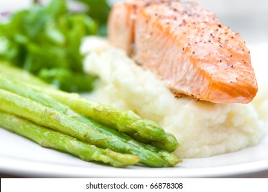 Baked salmon with mash potato and grilled asparagus - Powered by Shutterstock