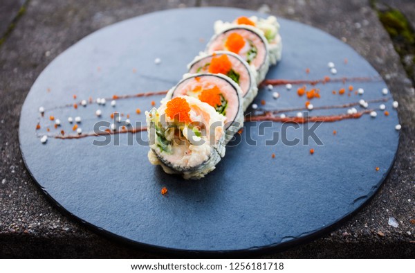 Baked Salmon Roll On Clay Plate Royalty Free Stock Image