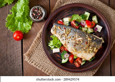 Baked Seabass With Greek Salad. Top View