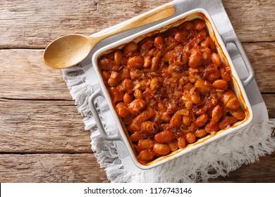 Baked Spicy Beans Prebranac Close-up In A Baking Dish On A Table. Horizontal Top View From Above
