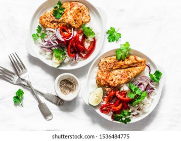 Baked spicy chicken breast with sweet pepper and rice -  delicious mexican style lunch on a light background, top view. Fajitas bowl    - Shutterstock ID 1536484775