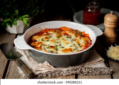 Baked Stuffed Conchiglioni with Tomato Sauce, rustic style