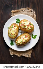 Baked Stuffed Potatoes With Bacon, Green Onion And Cheese, Top View.