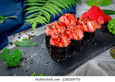 Baked Sushi Rolls With Sesame Shrimp Cap And Unagi Sauce. Traditional Japanese Cuisine