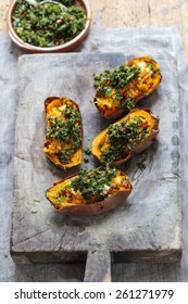 Baked Sweet Potato With Crispy Kale, Walnuts And Feta Cheese