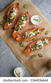 Baked Sweet Potato With Lentils, Feta, Herbs And Green Chilli