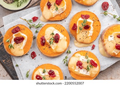 Baked Sweet Potato Rounds Topped With Brie Cheese, Cranberry And Walnut. Thanksgiving Appetizer Bites.