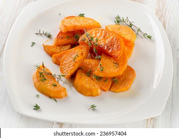 Baked Sweet Potato Wedges With Herbs. Selective Focus