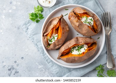 Baked Sweet Potato With Yogurt Sause. Top View.