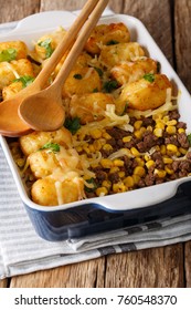 Baked Tater Tots With Ground Beef, Corn And Cheese Close-up On The Table. Vertical
