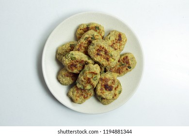 Baked Tater Tots On A White Background. Top View