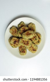 Baked Tater Tots On A White Background. Top View