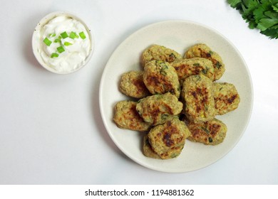 Baked Tater Tots On A White Background. Top View