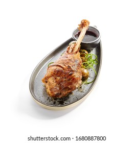 Baked Turkey Drumstick Side View. Delicious Paultry Meal With Sauce. Roasted Meat With Mushrooms And Greenery. Tasty Grilled Dish With Onion On Tray. Culinary Recipe, Food Composition