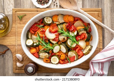 Baked vegetables mix. Oven roasted carrots, onion, zucchini and bell pepper.