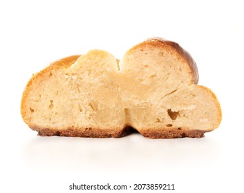 Baked yeast bread slice with undercooked and raw dough. Cross-section of white bread called zopf or challa. Concept for danger of eating raw dough, baking problems or stove broken. Isolated on white. - Shutterstock ID 2073859211