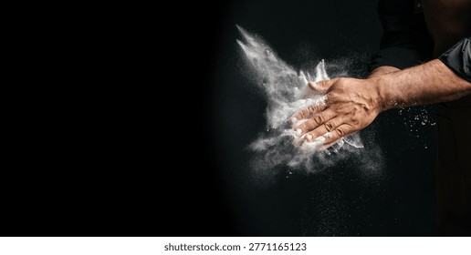 Baker clapping hands with flour, dynamic powder explosion in air, dramatic lighting, minimal dark background with large copy space for advertising