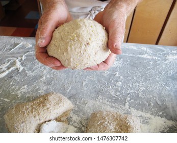  Baker In A Country Bakery Making A Sourdough Bread With Seeds.                               