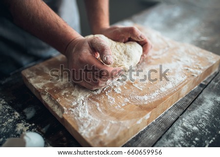 Similar – Foto Bild Frau beim Kneten von handwerklichem Brot auf Holztisch