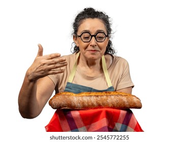 Baker woman wearing apron and glasses smelling a freshly baked loaf of bread - Powered by Shutterstock