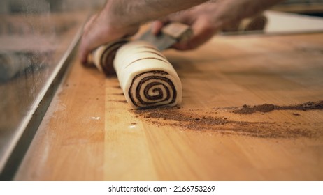 Baker Working With Handmade Pastries In Small Bakery. Cocoa Snail Roll, Chocolate Roll. Closeup Photo Of Not Staged, Authentic Moment.