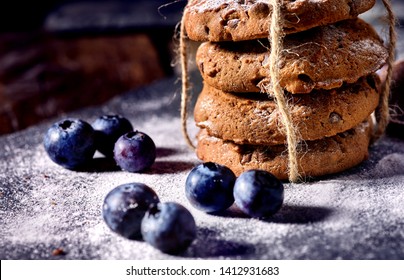 Bakers Gonna Bake. Serving Food On Slate. Oatmeal Cookies Biscuit With Blueberry On Dark Tiles Countrylike. Chocolate Chip Cookies Tied With String Shop On Window Display.