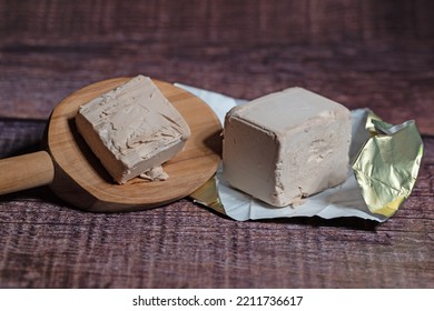 Baker's Yeast On A Wooden Spoon In A Closeup