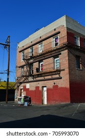 BAKERSFIELD, CA - AUGUST 27, 2017: This Poorly-maintained Apartment Building Houses Residents Who Live In Poverty And Have Little Prospect Of Improving Their Economic Status.