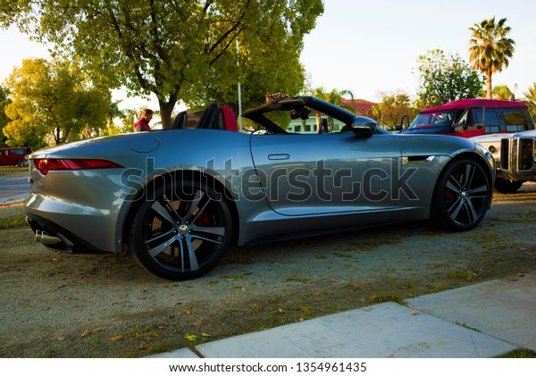 BAKERSFIELD, CA - MARCH 30,\
2019: The Coffee and Cars event today is visited by the owner of\
this new Jaguar F-Type convertible, who is sure it will be a\
classic one day.